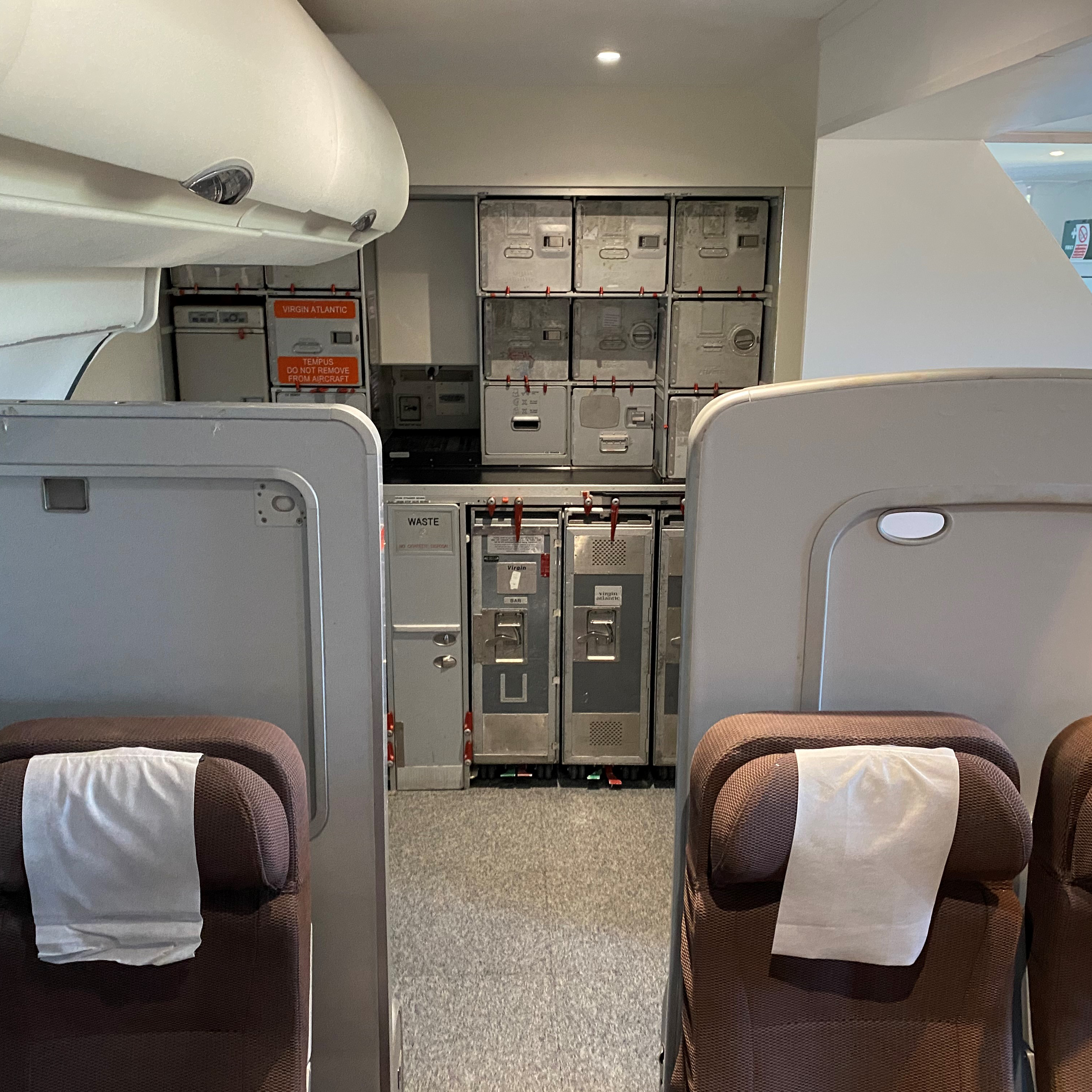 Galley area of Airplane Cabin mock-up, including carts, boxes, and ovens, at the WFC Training Facilities.